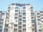 The three allegedly died by suicide by jumping off a modified window of their ninth-floor flat in a Ghaziabad high-rise. (HT PHOTO)