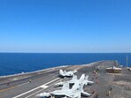 Visuals from US Central Command's official X handle showed a series of fighter jets and sailors aboard the ship moving in a well-orchestrated routine.