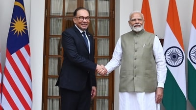 Prime Minister Narendra Modi, shakes hand with his Malaysian counterpart Anwar Ibrahim before their delegation level meeting at Hyderabad House in New Delhi. (Photo by Arvind Yadav/ Hindustan Times) Prime Minister Narendra Modi, shakes hand with his Malaysian counterpart Anwar Ibrahim before their delegation level meeting at Hyderabad House in New Delhi. (Photo by Arvind Yadav/ Hindustan Times)