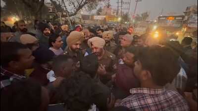 Residents of Jagatpura, Dhuri , holding a protest on Thursday. (HT)