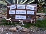 A supportive sign left by neighbors is posted outside of the home of Nancy Guthrie, the 84-year-old mother of U.S. journalist and television host Savannah Guthrie, who went missing from her home in Tucson, Arizona, U.S. February 4, 2026.  