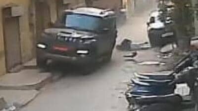 Screengrab of the CCTV video showing the car feeling away leaving the girl behind. (HT) Screengrab of the CCTV video showing the car feeling away leaving the girl behind. (HT)