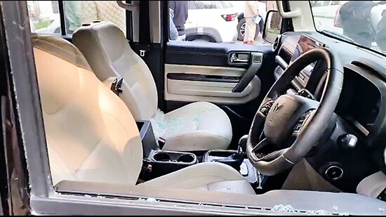 Window glasses seen scattered on the seats inside the car in which AAP leader Lucky Oberoi shot dead by armed assailants near a gurdwara, in Jalandhar on Friday. (ANI Video Grab)