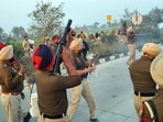 Bathinda police lobs tear gas to disperse the protesting BKU (Ekta Ugrahan) activists. (Sanjeev Kumar/HT)