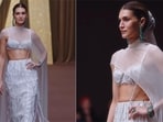 Kriti Sanon stuns on the runway in white outfit at Dubai Fashion Week 2026. (Instagram)