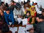 People get their documents verified during hearings under the Special Intensive Revision (SIR) of electoral rolls, in Prayagraj.