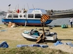 Workers prepare a cruise ship, ahead of the launch of cruise service on Yamuna river, in New Delhi. Workers prepare a cruise ship, ahead of the launch of cruise service on Yamuna river, in New Delhi.