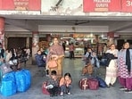 Passengers stranded at the ISBT in Ludhiana on Friday. (Gurpreet Singh/HT)