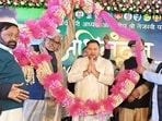 RJD national working president Tejashwi Yadav being felicitated with makhana garlands during the Abhinandan Samaroh at the RJD office in Patna on Saturday. (Santosh Kumar/HT)