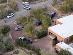 A drone view shows investigators searching the home of Nancy Guthrie, the 84-year-old mother of U.S. journalist and television host Savannah Guthrie, who went missing from her home in Tucson, U.S. February 6, 2026.  