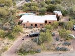 The search for 84-year-old Nancy Guthrie enters its seventh day, facing geographic and technical challenges in the Catalina Foothills. REUTERS/Rebecca Noble