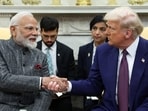 US President Donald Trump and Prime Minister Narendra Modi shake hands, at the White House in Washington, DC, on February 13, 2025. 