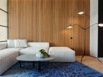 Wall panels add texture to the interiors. 