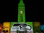 Feb 6, 2026; San Francisco, CA, USA; The Seattle Seahawks logo is projected on the Ferry Building. Mandatory Credit: Kirby Lee-Imagn Images