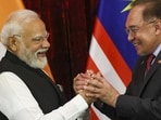 Prime Minister Narendra Modi with Malaysian Prime Minister Anwar Ibrahim during the exchange of MoUs, in Kuala Lumpur, (PMO via PTI) Prime Minister Narendra Modi with Malaysian Prime Minister Anwar Ibrahim during the exchange of MoUs, in Kuala Lumpur, (PMO via PTI)