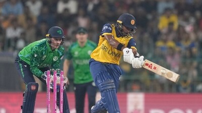Kamindu Mendis came into the crease and played a fiery cameo changing the momentum of the match. (AP) Kamindu Mendis came into the crease and played a fiery cameo changing the momentum of the match. (AP)