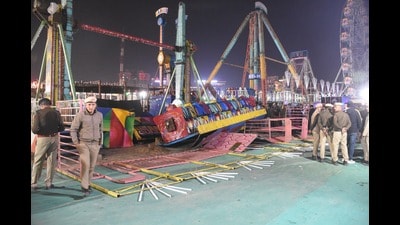 Accused booked under BNS Section 105; SIT formed to probe mechanical failure. Rides shut till probe ends; govt announces compensation and job for inspector’s kin. (Subhash Sharma/HT) Accused booked under BNS Section 105; SIT formed to probe mechanical failure. Rides shut till probe ends; govt announces compensation and job for inspector’s kin. (Subhash Sharma/HT)