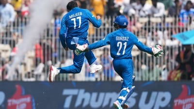 Afghanistan’s Mujeeb Ur Rahman made an immediate impact in New Zealand’s chase, striking twice in the second over to remove Finn Allen for just one and Rachin Ravindra for a duck, leaving the Kiwis reeling early. (AP) Afghanistan’s Mujeeb Ur Rahman made an immediate impact in New Zealand’s chase, striking twice in the second over to remove Finn Allen for just one and Rachin Ravindra for a duck, leaving the Kiwis reeling early. (AP)