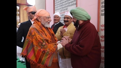 Prime Minister Narendra Modi with former chief minister Capt Amarinder Singh. (HT Photo)