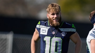 Cooper Kupp, NFL wide receiver, and Anna Kupp share a strong bond since their high school track days. They prioritize family while managing Cooper's football commitments. (AP) Cooper Kupp, NFL wide receiver, and Anna Kupp share a strong bond since their high school track days. They prioritize family while managing Cooper's football commitments. (AP)