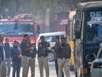 Bomb disposal squad and police team outside a school in Rajendra Nagar. (Sanchit Khanna/HT Photo)