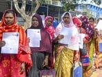 People wait in queues during hearings under the Special Intensive Revision of electoral rolls at Krishnanagar in Nadia (PTI)