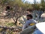 A Pima County Sheriff's Office deputy stands outside of the home of Nancy Guthrie on February 8, 2026 in Tucson, Arizona. Nancy Guthrie, the 84-year-old mother of U.S. journalist and television host Savannah Guthrie, went missing from her home in the early hours of February 1. 