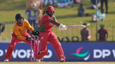 Vinayak Shukla and Mehmood struck together a partnership looking to take Oman to a respectable total. (AP) Vinayak Shukla and Mehmood struck together a partnership looking to take Oman to a respectable total. (AP)