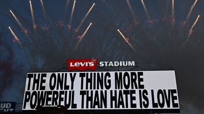 A message is displayed while Puerto Rican singer Bad Bunny performs during the Super Bowl LX Patriots vs Seahawks Apple Music Halftime Show at Levi's Stadium. (Photo by JOSH EDELSON / AFP) (AFP) A message is displayed while Puerto Rican singer Bad Bunny performs during the Super Bowl LX Patriots vs Seahawks Apple Music Halftime Show at Levi's Stadium. (Photo by JOSH EDELSON / AFP) (AFP)