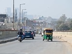 Bitumen laying, lane marking and fixtures planned; drain work and road fixes nearby aim to ease congestion on key link to Dwarka Expressway. (Parveen Kumar/HT)