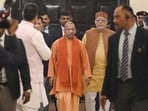 Chief minister Yogi Adityanath and finance minister Suresh Khanna arrive at the UP legislative assembly on the second day of the budget session on Tuesday. (HT)
