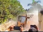 Illegal farmhouse of jailed murder accused Vinod Kumar, alias Vinod Khopdi being demolished in Bokaro on Tuesday (HT PHOTO)