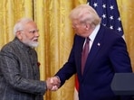 US President Donald Trump and Prime Minister Narendra Modi shake hands as they attend a joint press conference at the White House in Washington.