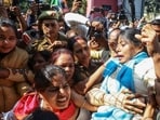 Police detain Apna Dal (Kamerawadi) leader, Pallavi Patel, and her supporters during their protest march demanding implementation of the UGC Equity Regulations 2026, near a reserve police line, in Lucknow on Tuesday. (ANI Photo)