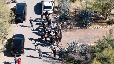 TUCSON, ARIZONA - FEBRUARY 8: In an aerial view, investigators walk through a crowd of media gathered outside of the home of Nancy Guthrie on February 8, 2026 in Tucson, Arizona. Nancy Guthrie, the 84-year-old mother of U.S. journalist and television host Savannah Guthrie, went missing from her home in the early hours of February 1. Rebecca Noble/Getty Images/AFP (Photo by Rebecca Noble / GETTY IMAGES NORTH AMERICA / Getty Images via AFP) (Getty Images via AFP) TUCSON, ARIZONA - FEBRUARY 8: In an aerial view, investigators walk through a crowd of media gathered outside of the home of Nancy Guthrie on February 8, 2026 in Tucson, Arizona. Nancy Guthrie, the 84-year-old mother of U.S. journalist and television host Savannah Guthrie, went missing from her home in the early hours of February 1. Rebecca Noble/Getty Images/AFP (Photo by Rebecca Noble / GETTY IMAGES NORTH AMERICA / Getty Images via AFP) (Getty Images via AFP)