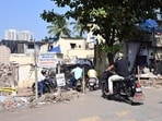 A key hurdle in the construction of the proposed 120-ft Development Plan (DP) Road connecting Lokhandwala Township to Thakur Village in Kandivali (East) was cleared on Wednesday, with 120 families receiving keys to their rehabilitation flats in the Mahaveer building. (Photo by Raju Shinde/HT Photo) (Raju Shinde)