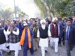 Governor Gulab Chand Kataria and head of Radha Soami Satsang Beas Baba Gurinder Singh Dhillon (R)  along with Punjab BJP working president Ashwani Sharma during a march against drugs in Ferozepur on Tuesday. (HT)
