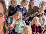 James Van Der Beek (L) and Kimberly Van Der Beek with their children (R).