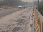 The stretch was damaged during construction of the Bhangel elevated road by the UPSBCL that has now completed and opened for public use, said officials. (HT Photo)