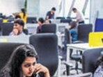 Tiny Owl employees work at computers inside the company's head office in Mumbai, India, on Monday, March. 9, 2015. Tiny Owl is a smartphone application that helps hungry city-dwellers scour nearby eateries for deliveries. The service now handles 2,000 orders each day and has caught the interest of venture funds including Sequoia Capital, an early backer of technology giants such as Apple Inc. and Oracle Corp. Photographer: Dhiraj Singh/Bloomberg (Bloomberg)