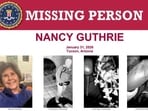 A poster features Nancy Guthrie and an armed individual appearing to have tampered with the camera at her front door the morning of her disappearance at her home in Tucson, Arizona, U.S.