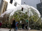 Amazon’s Seattle headquarters. Such huge tech companies can afford to get around a new fee for foreign-worker visas.
