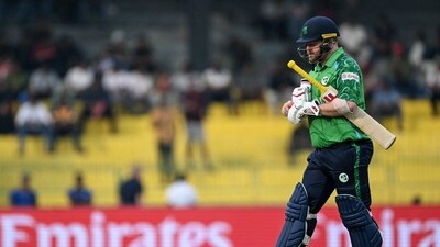 Paul Stirling walked off with a cramp after playing the first ball of the innings. (AFP) Paul Stirling walked off with a cramp after playing the first ball of the innings. (AFP)