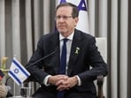 File photo of Israel's President Isaac Herzog looks on during a meeting with the German Chancellor at his residence in Jerusalem on December 6, 2025.