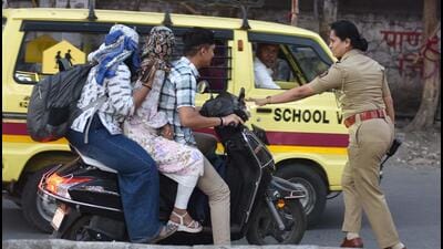 Pune traffic police penalise over 2,300 triple-seat riders, collect ₹43.5L in fines Pune traffic police penalise over 2,300 triple-seat riders, collect ₹43.5L in fines