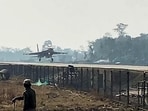 An Indian Air Force aircraft during a trial run at the Emergency Landing Facility (ELF) built on the Moran bypass. (ANI Video Grab)