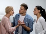 The man supported his wife during a fiery argument with his mother. (Pinterest)