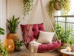 A cosy balcony corner with a soft hammock swing, light cushions and plants creating a calm spot for daily unwinding.(Ai generated)