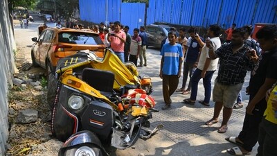 An auto stands damaged at the site of accident in Mumbai's Mulund after an under-construction metro tower collapsed on the vehicle, killing one and injuring at least three people. (Satish Bate/Hindustan Times)