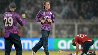 For Scotland, Oliver Davidson returned with figures of 1/12 (2). (AFP) For Scotland, Oliver Davidson returned with figures of 1/12 (2). (AFP)
